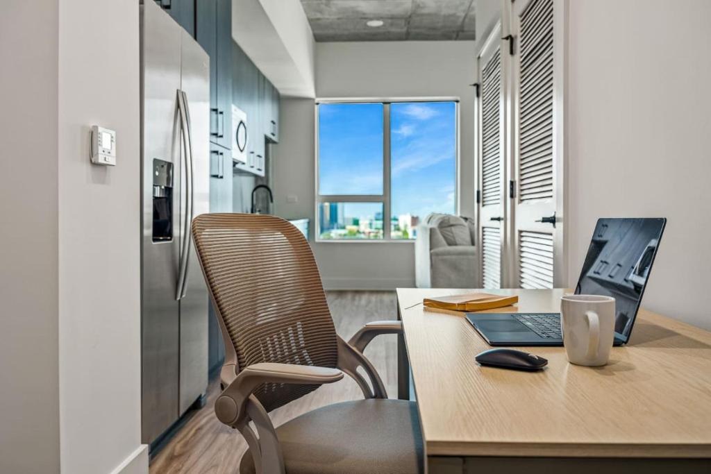 Channel District Apartment | 14th Floor SkySuite Studio | DT Views | Pool & Gym