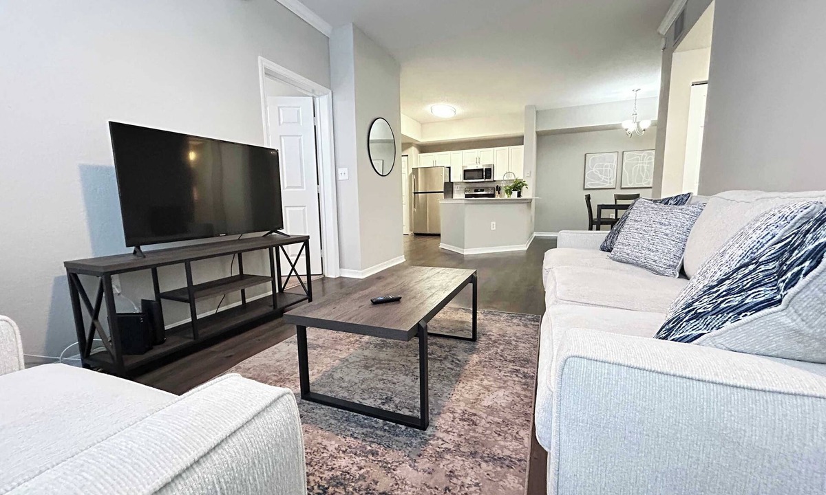 Westchase Apartment | 2 BR with Private Garage, Boutique Shops & Pond Views