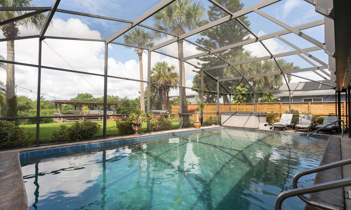New Smyrna Beach House | A Fisherman's Dream! Large Pool, Hot Tub, Canal front, Private Dock, a Must See!