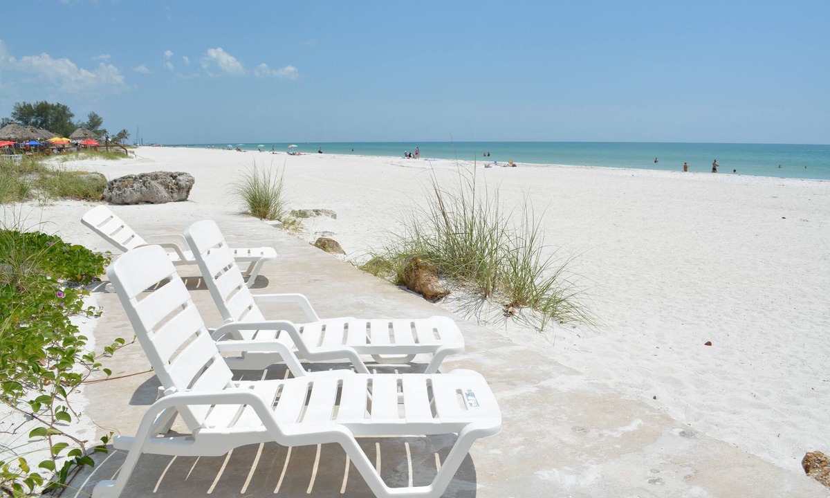 Bradenton Beach Condo | Beach House 1 Beach Front Panoramic Sunset Views Screened Lanai