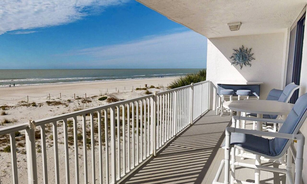 Madeira Beach Condo | Beachfront 2BR with Huge Private Balcony, Pool & Hot Tub & Incredible Madeira Beach Sunset.