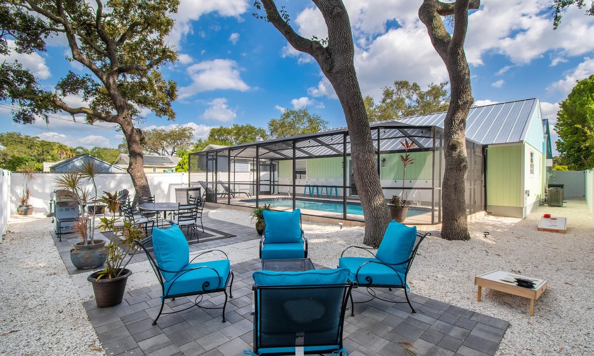 Palm Harbor House | Beautiful Ibis Cottage for outdoor lovers with pool, fire pit, and billiard room
