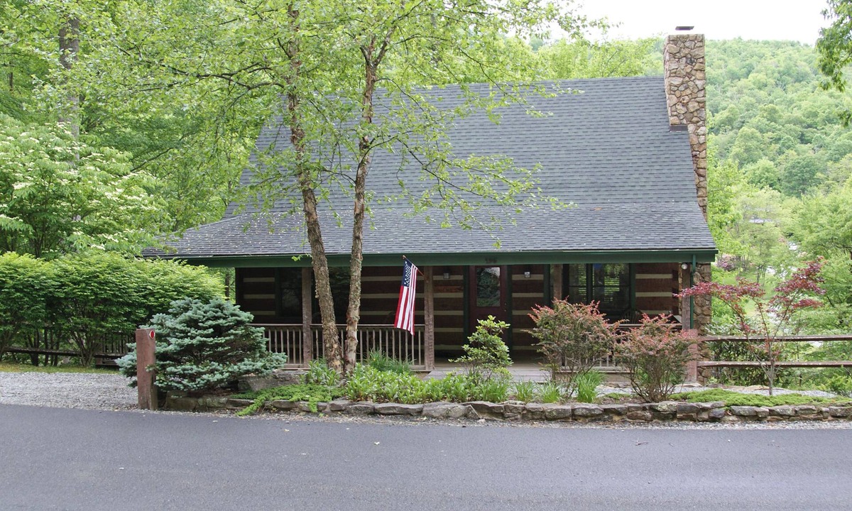 Seven Devils Cabin | Book your Summer getaway now! Firepit. Pond view.