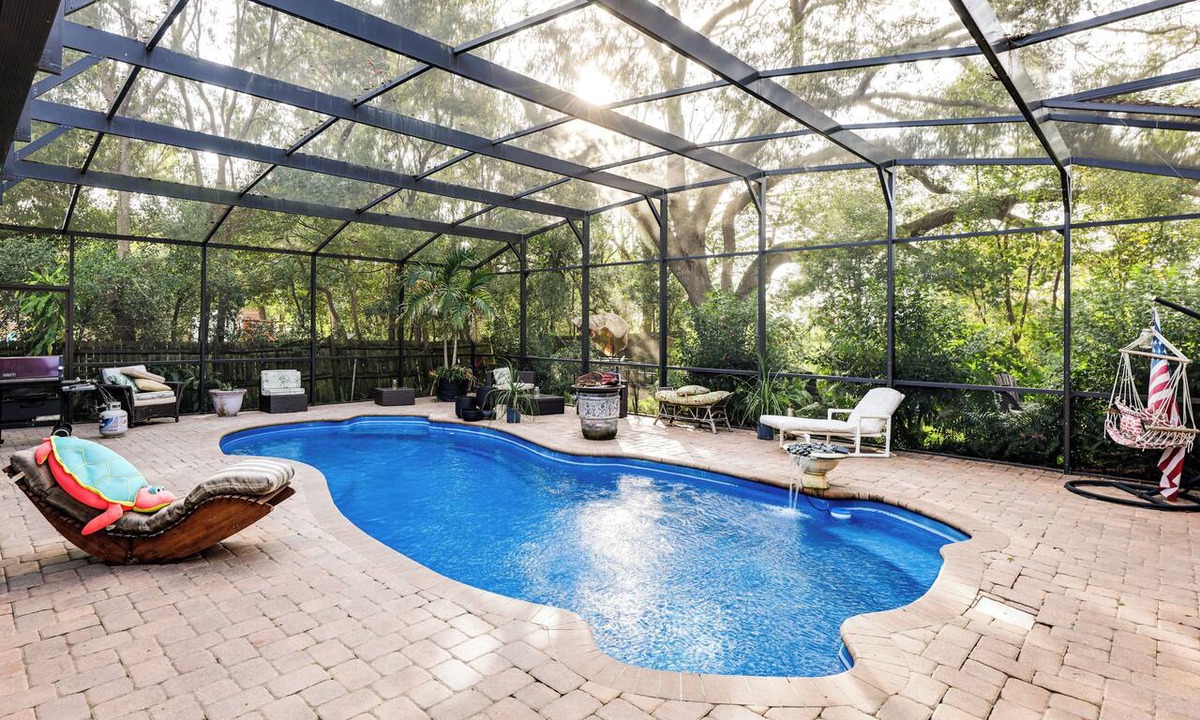 Tavares Apartment | Canal-Front Retreat w/Hot Tub & Dock in Tavares