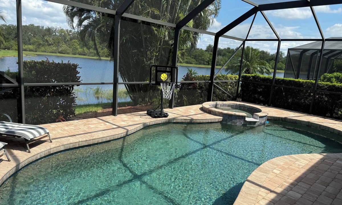 Braden River House | Enjoy it all! 3 BR home, private pool on prestigious River Strand golf course
