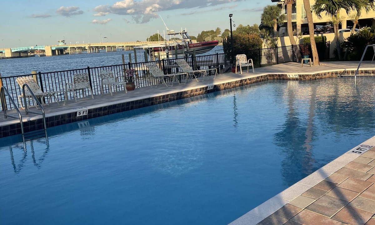 St. Pete Beach Condo | Fully Renovated Waterfront Views Walk to Beach