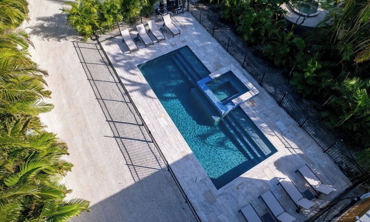 Holmes Beach House | Home with heated pool, spa, games, walk to beach