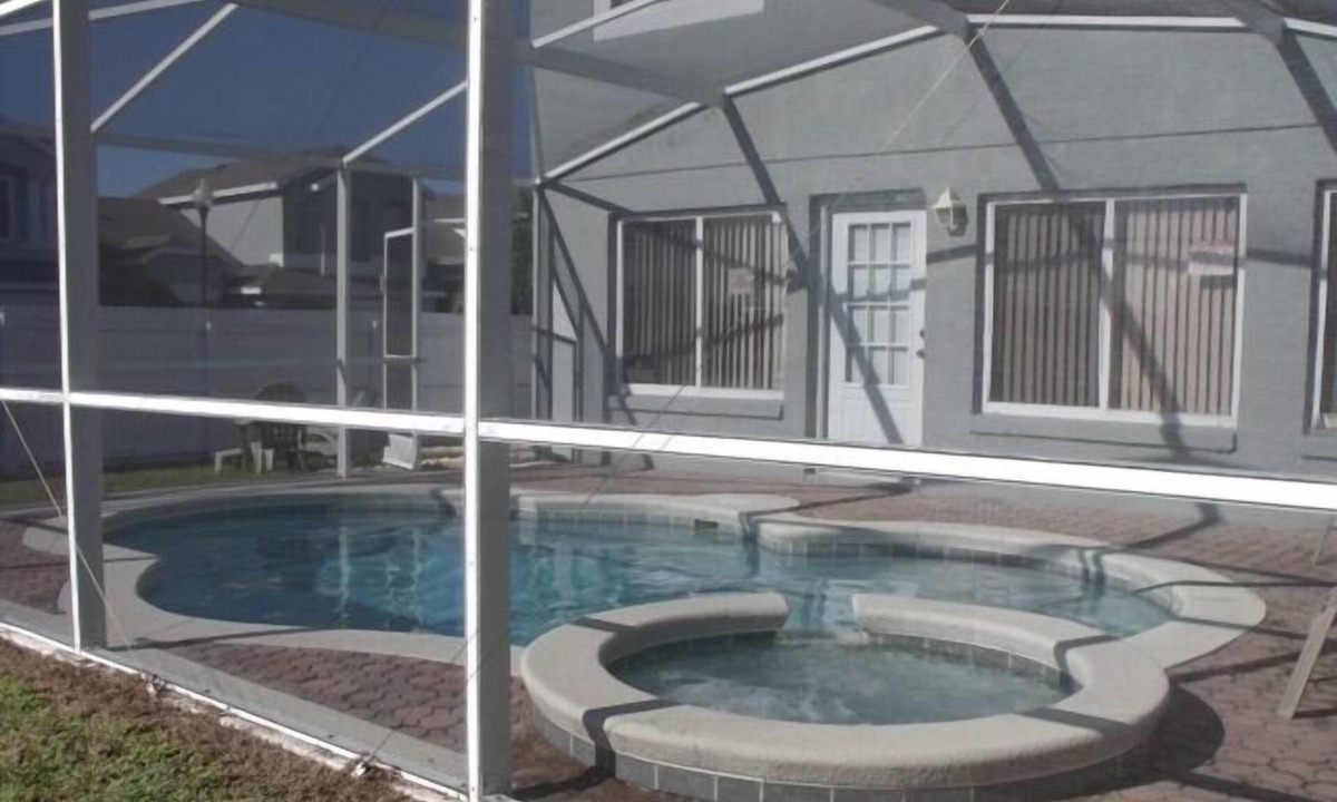 Meadow Woods House | Lake view 4 Bedroom Family Vacation Pool Home in Orlando, Florida