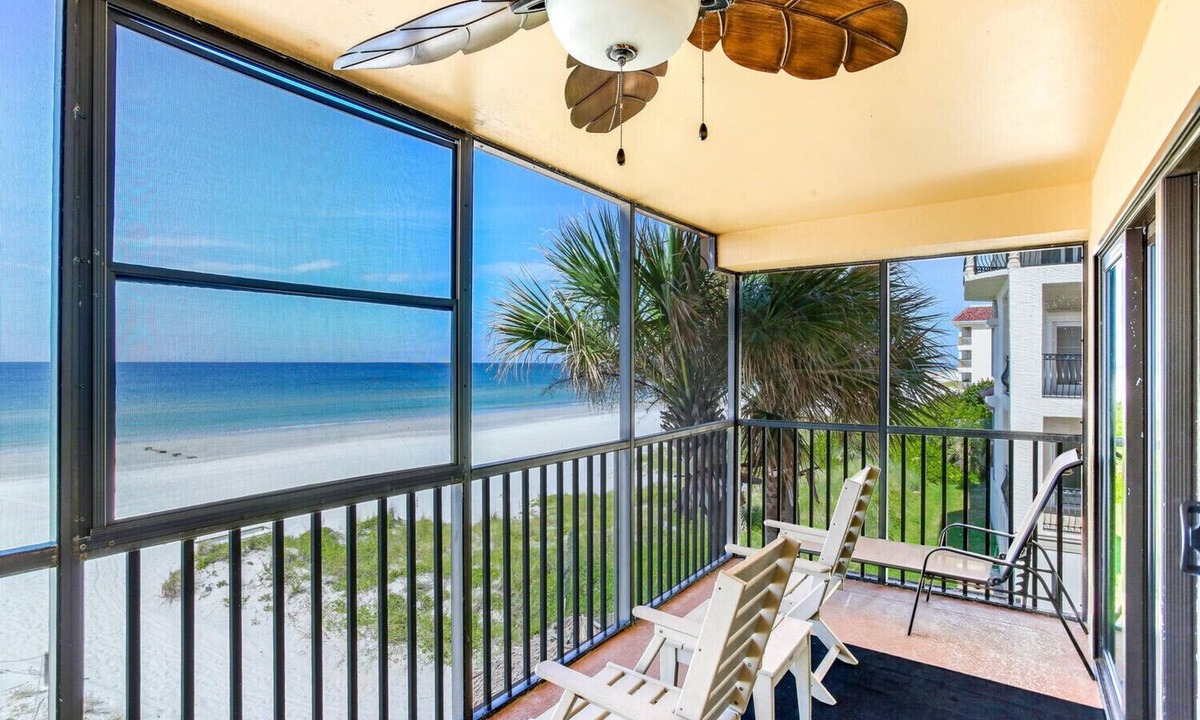Madeira Beach Condo | Luxury Beachfront Corner Condo 3 BR 2 BA with a Pool - It’s 5 o’clock somewhere!