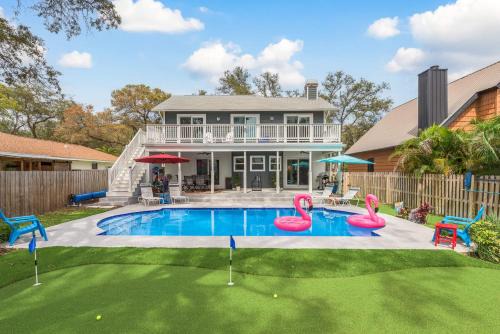 Tarpon Springs House | Luxury Family Beach Escape with Heated Pool and Putting Green