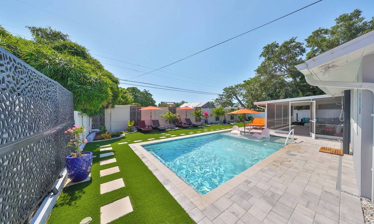 Palma Sola House | Modern Family Beach Oasis w/Heated Saltwater Pool Home, 5 miles from Anna Maria