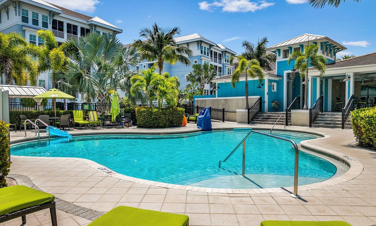 Whitney Beach Condo | One Particular Harbour 388-401 · Top Floor · Pool Lanai