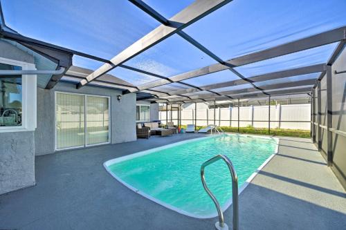 Orchid Lake Village House | Port Richey Getaway w/Lanai, Pool & Grill!
