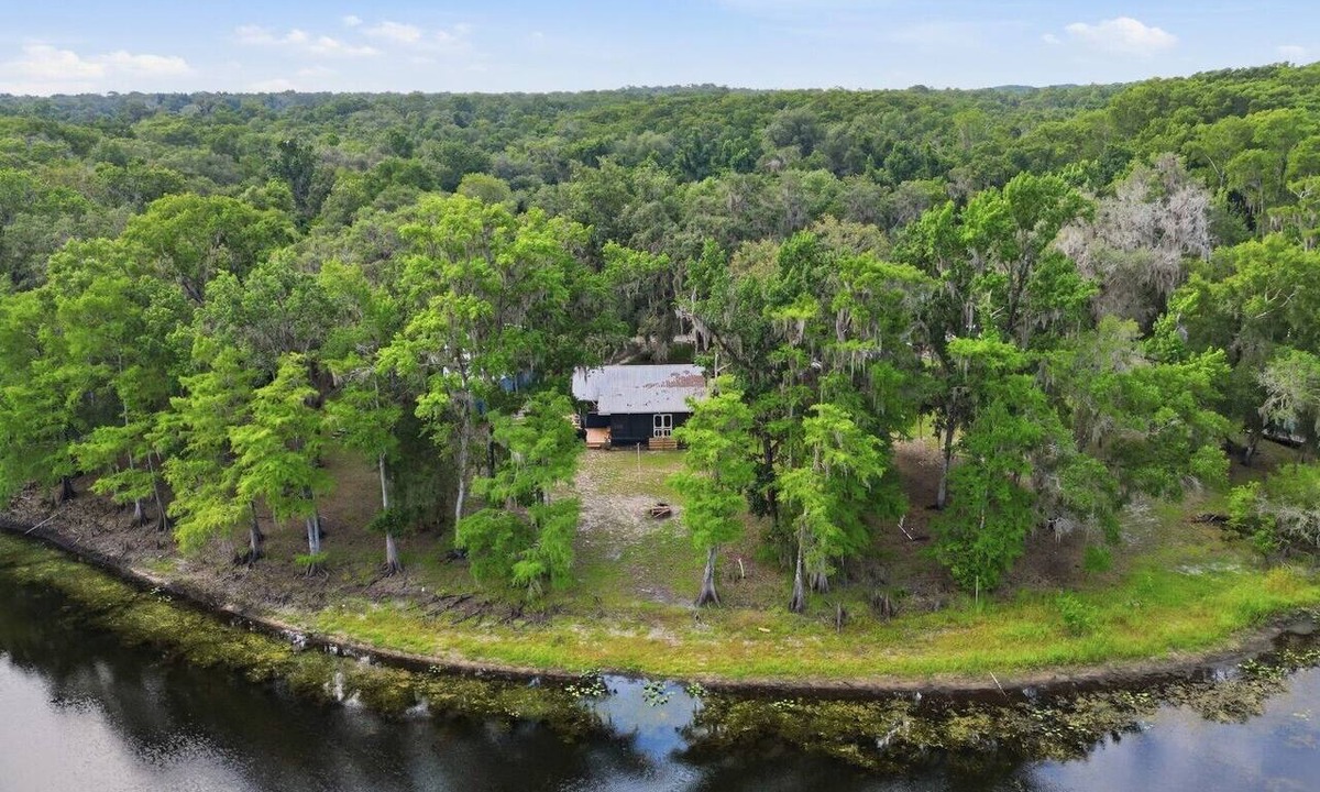 Bushnell Cabin | Riverfront Cabin w Screened Patio & Fire Pit!