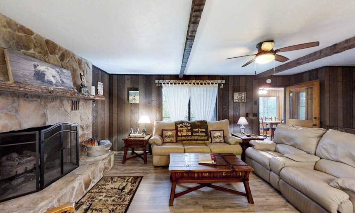 Murphy House | Secluded home with deck, firepit, sunroom, gas fireplace, & W/D