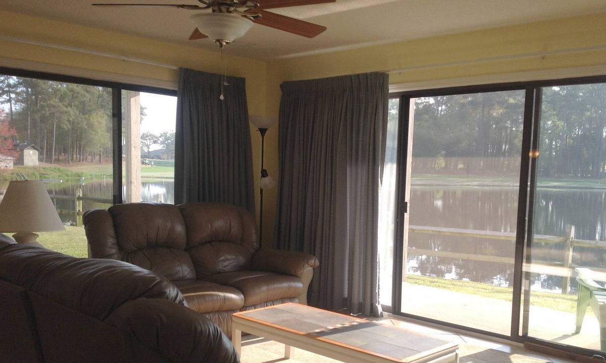 Sea Trail Condo | Spacious, First Floor Corner Unit, brings outdoors in w/ magnificent pond view!
