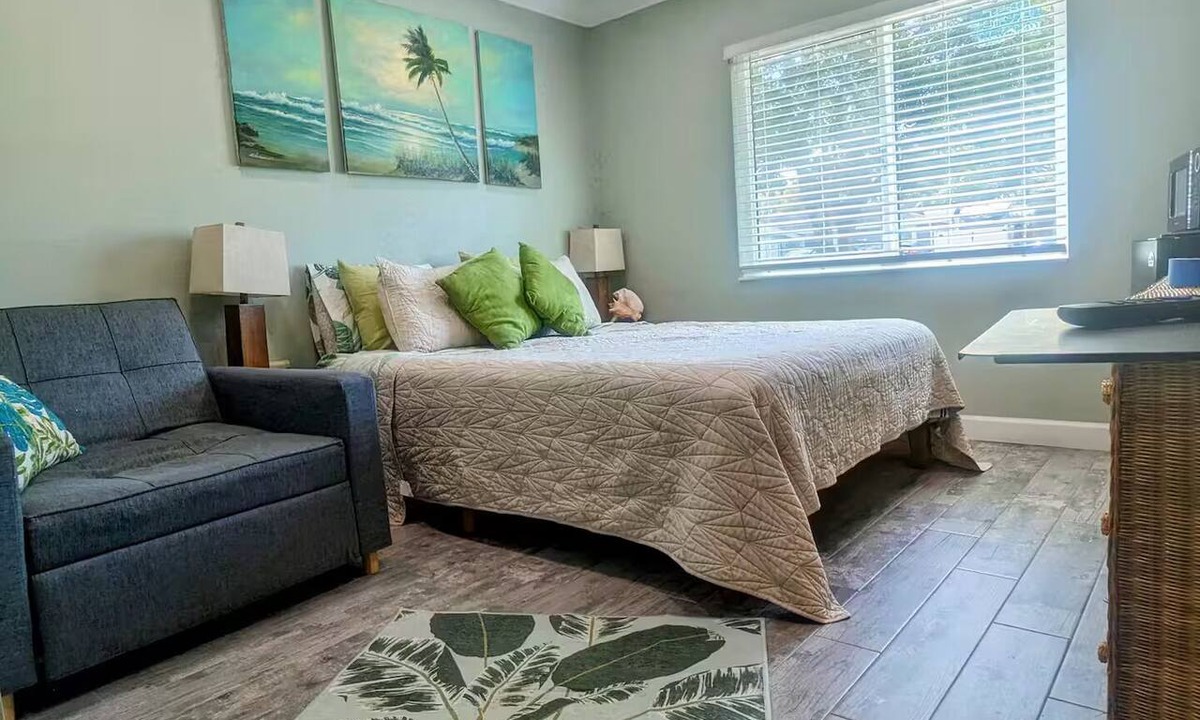 Seminole Apartment | The Florida Room, Private entry, driveway parking, fenced outside seating area