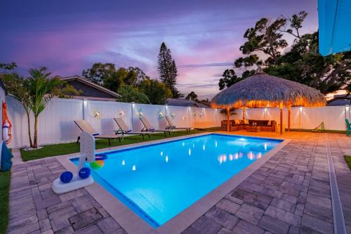 Largo House | Tiki Paradise Resort Heated Saltwater Pool