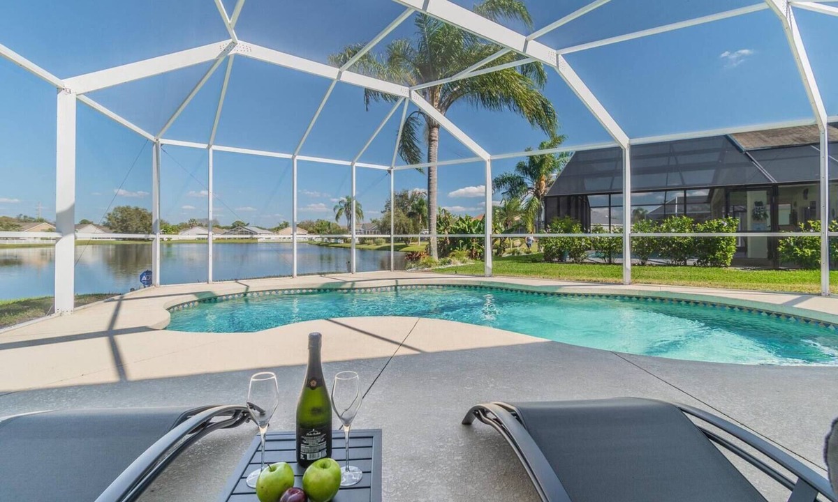 Sabal Harbour House | Villa Madeira - Stylish Pool Abode with Lake Views by The Bay & Key Collection