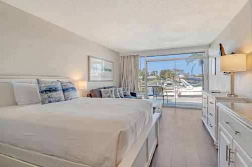 Trailer Estates Apartment | Waterfront Hotel Room, Huge Pool, Tiki Bar, Beach!