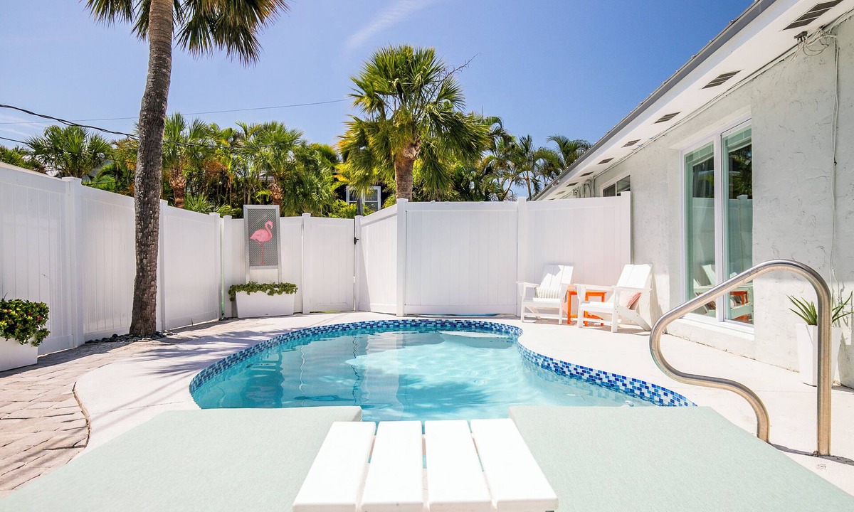 Holmes Beach House | While Away A · EV Charger · Fenced Pool · Renovated 2025