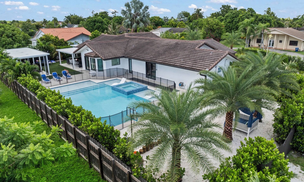 Ludlam Resort | You'll be captivated by the stunning 28 x 40 custom heated pool with jacuzzi
