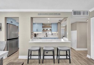 Beachfront condo with pool, gym and tennis courts