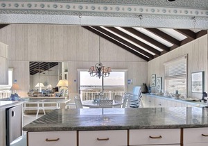 FRIDAY TO FRIDAY RENTAL. Enjoy the beautiful sunsets - Large 2nd floor deck with pretty water views and great awnings to block the warm afternoon sun.