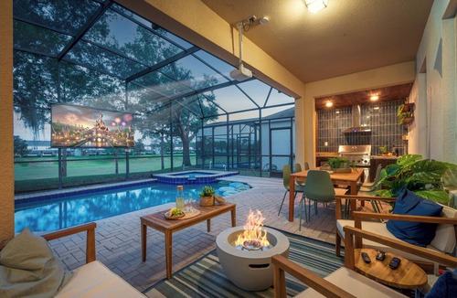 Windsor Hills Villa | 10 Min to Disney, 6BD, Themed, Game Room, Sauna & Pool, Golf Sim, Free Waterpark