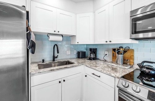 Bayview Condo | 1BR Waterfront Condo + Private Beach + Heated Pools + Stylish Remodel in St Pete