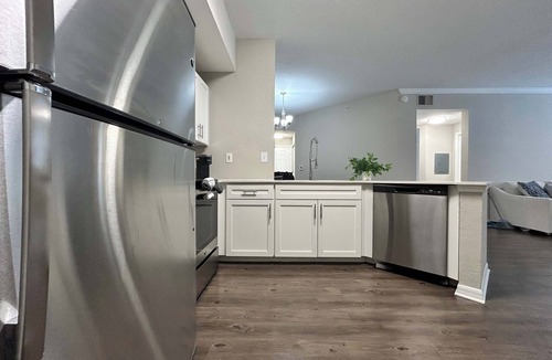Westchase Apartment | 2 BR with Private Garage, Boutique Shops & Pond Views