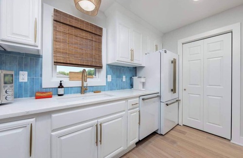 Colington House | 2 Private Living Spaces, 2 Hot Tubs and Bikes!