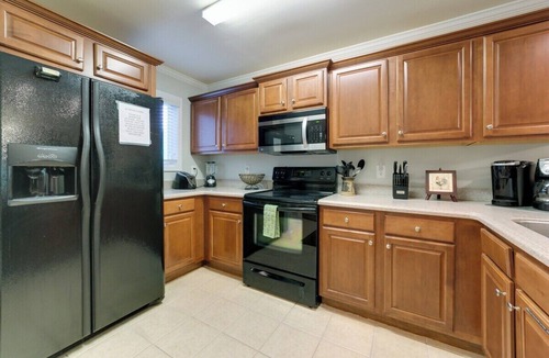 Helen Condo | 3BR Helen condo with 2 hot tubs, fireplace, riverfront deck