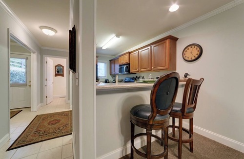 Helen Condo | 3BR Helen condo with 2 hot tubs, fireplace, riverfront deck