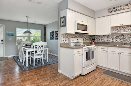 Butler Beach House | 4BR Home w/Private Dock and Fenced Backyard and Firepit. Minutes from the Beach