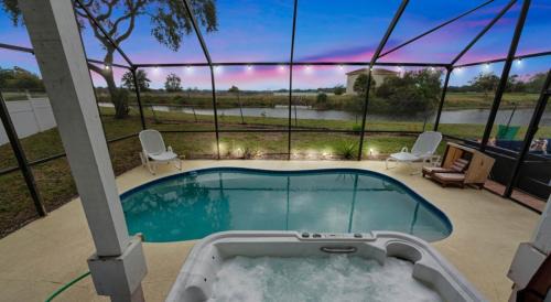 Largo Villa | 6BR Waterfront Heated Pool Hot Tub Game Room
