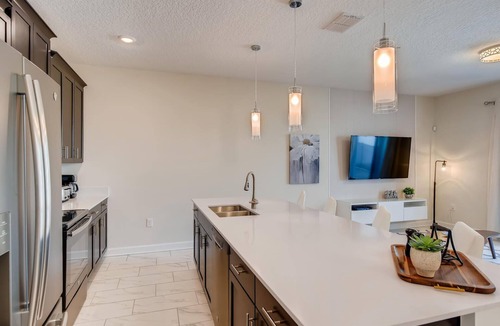 Four Corners Villa | 8953 CC - 4BR Townhome with Sparkling Pool