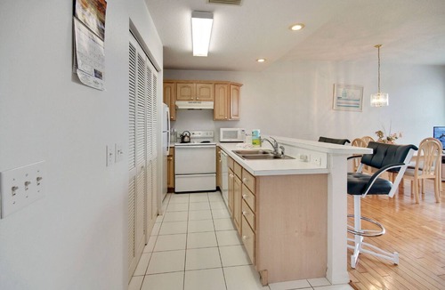 Treasure Island Condo | Amadeus 2 Top location, water font, steps to beach, restaurants and shopping!