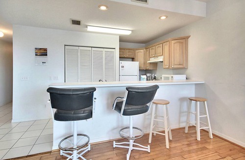 Treasure Island Condo | Amadeus 2 Top location, water font, steps to beach, restaurants and shopping!