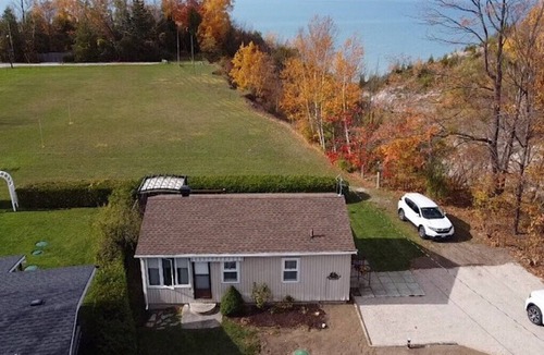 Central Huron Cottage | Amazing Lakeview-Cozy Cottage- Private Beach Access Sleeps 6