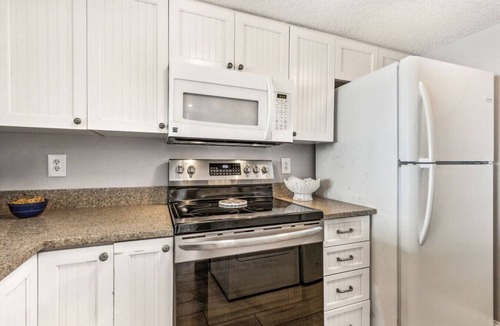 Amelia City Condo | Amelia Surf & Racquet Club B143 | 4th Floor Ocean Front Deluxe | Pools | Tennis Courts | Sleeps 6