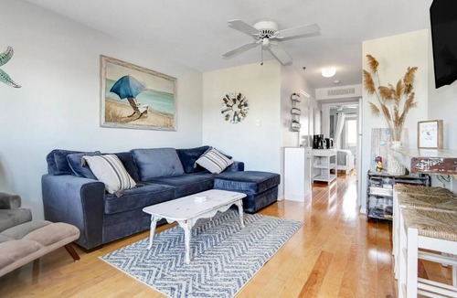Southend Condo | Beach Block! Beautifully furnished 1 bed/1 bath steps to the sand