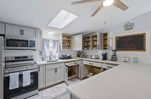 Palm Coast House | Beach Home: Heated Pool, Golf Cart, Kayaks, Fence