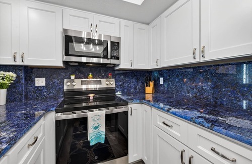 Indian Shores Condo | Beach Life: You are ON The BEACH! 3-bdrm Condo , heated pool, white sandy beach