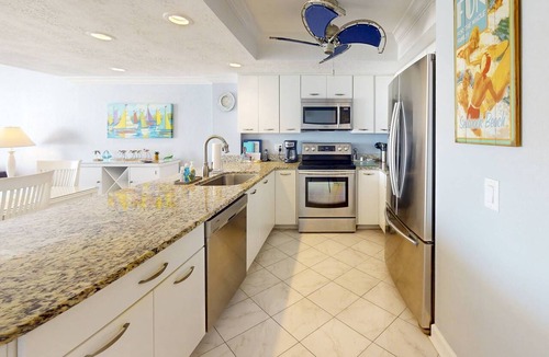 Madeira Beach Condo | Beachfront 2BR with Huge Private Balcony, Pool & Hot Tub & Incredible Madeira Beach Sunset.