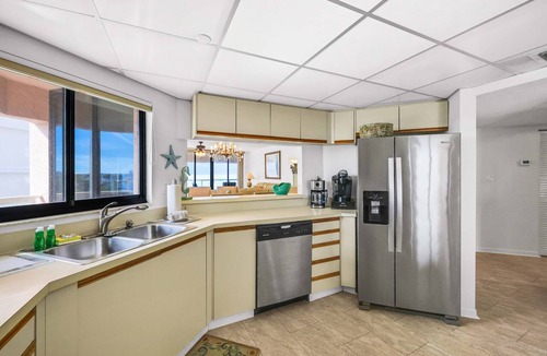 Sand Key Condo | Beachfront condo with multiple balconies heated pool gym hot tub and AC