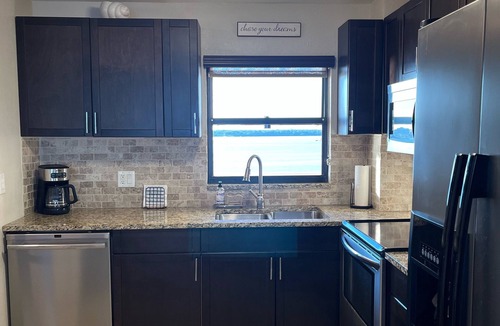 Sand Key Condo | Beachfront condo on Sand Key with balconies facing both Beach & The Intracoastal