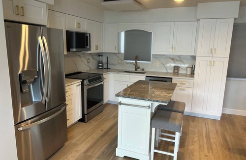 Brigantine House | Beachfront Townhouse – Steps to Sand, Ocean Views from Every Deck! NEW KITCHEN!