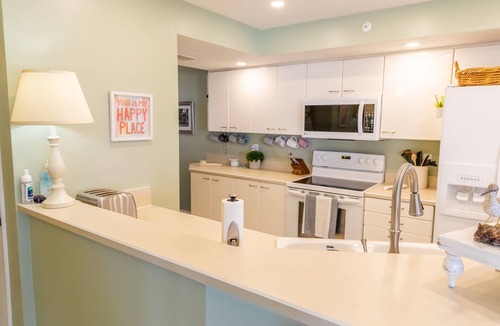 Ponce Inlet Condo | Beautiful beach and property with lots of room in our corner unit.