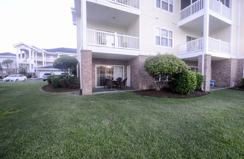 Central Myrtle Beach Condo | Beautiful private end unit! Featuring 2b/2b near swimming pool.